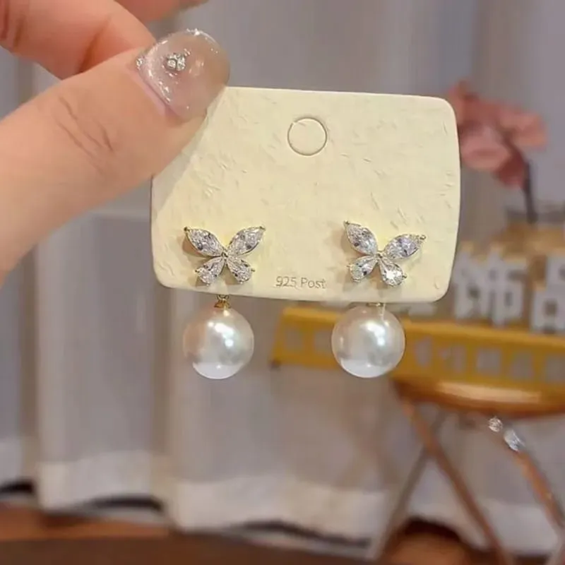 Aretes estilo mariposa y perla 160928