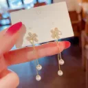Aretes diseño de flores con perla 160904