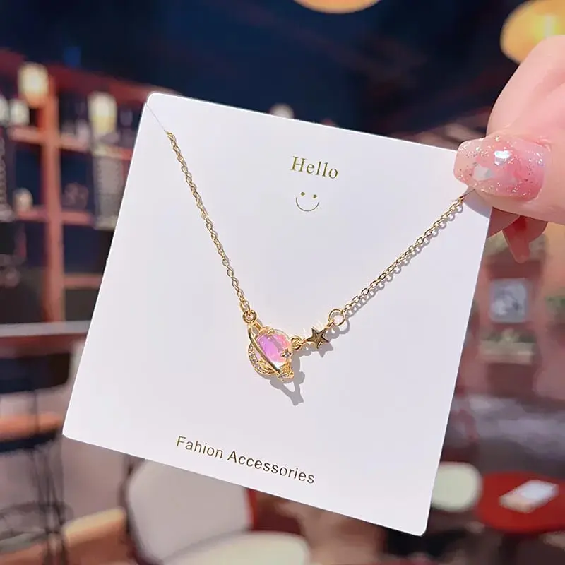 Colla planeta rosa de acero/titanio 260137