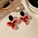 Aretes diseño de pétalo en esmalte y aleación 160918