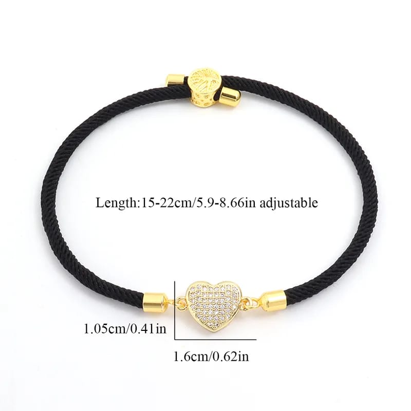 Brazalete negro corazón cobre lazo 28251