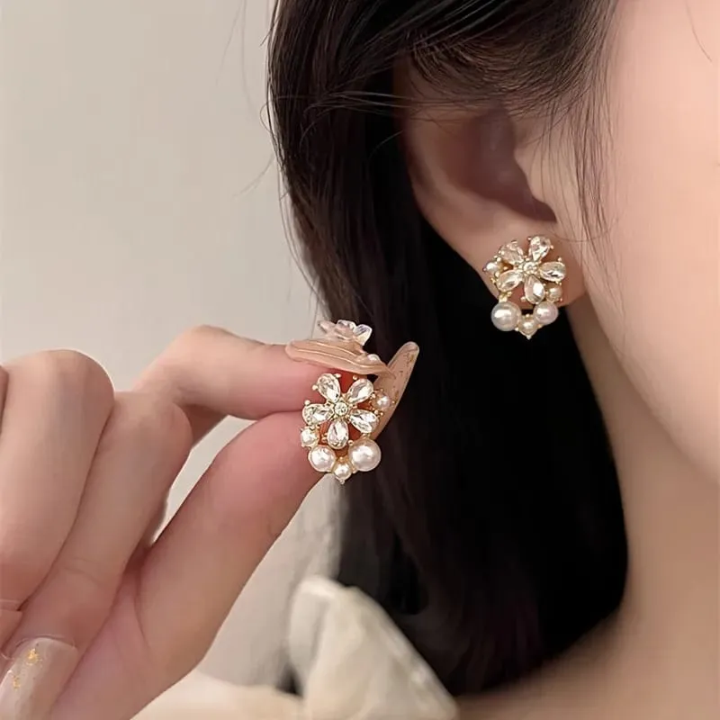 Aretes diseño de flores con perlas 160919