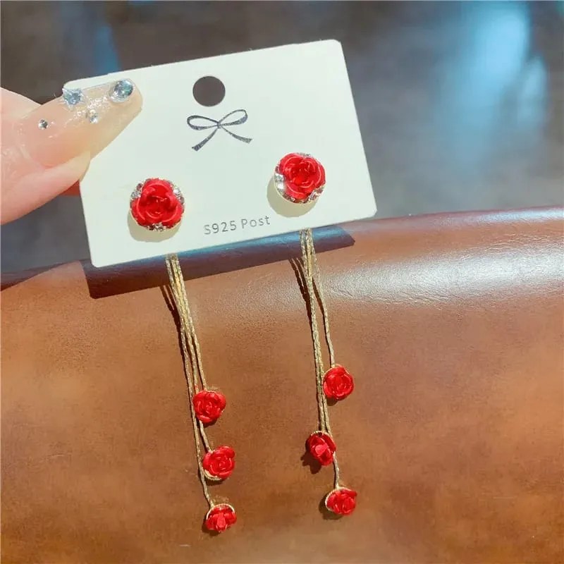 Aretes con diseño de rosas rojas 160916