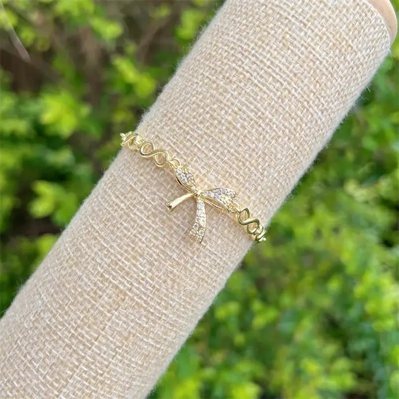 Pulsera moño dorado cobre chapeado 260112