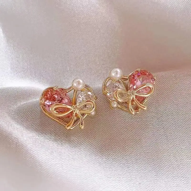 Aretes corazón rosa con moño fantasía 264703