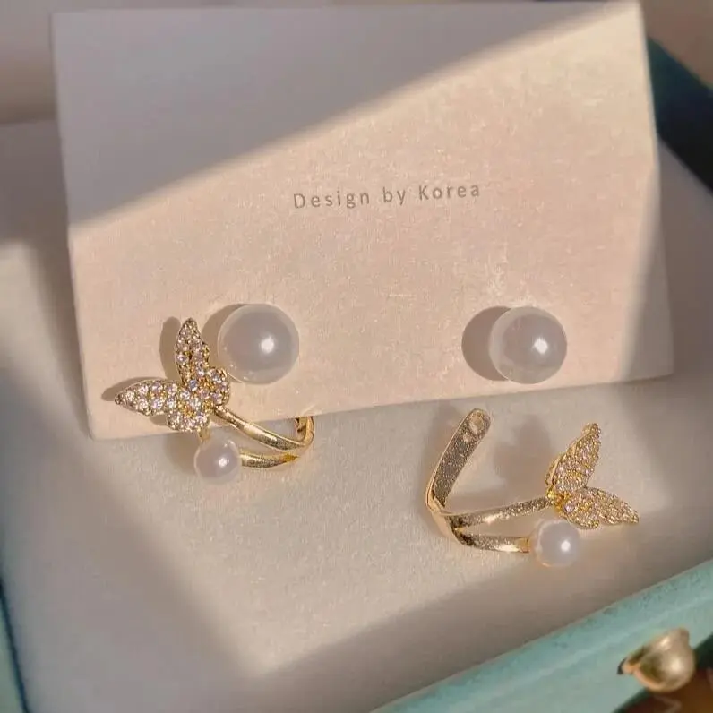 Aretes mariposa dorada con perla fantasía 264715