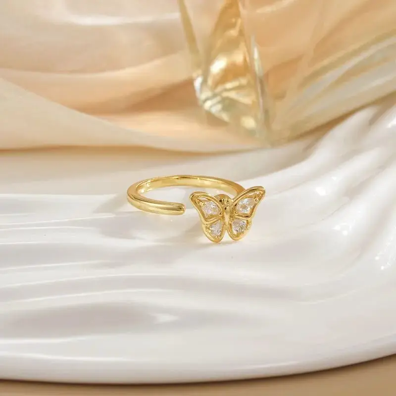 Anillo giratorio mariposa dorada cobre 264731
