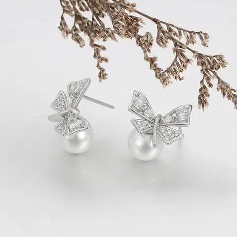 Aretes Xuping mariposa y perla cobre 2642433