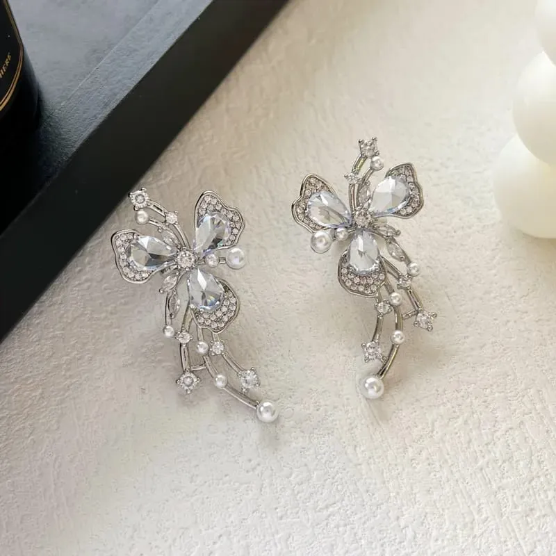 Aretes diseño de mariposa con incrustación  160925