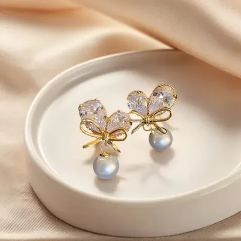 Aretes nudo plateado aleación con perla 190805