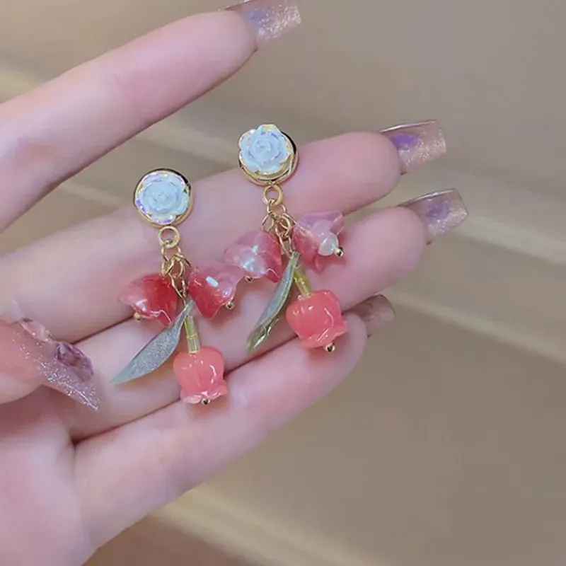 Aretes rosa blanca y triple flor fantasía 190809