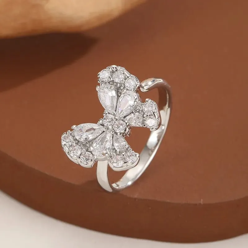 Anillo moño ajustable plateado fantasía 190824