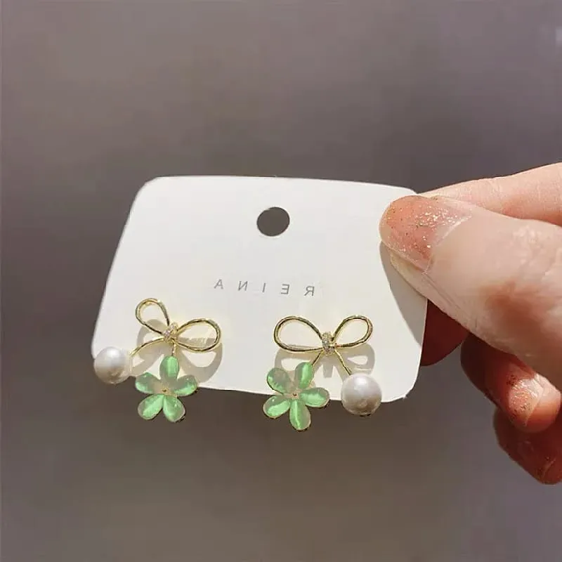 Aretes moño con flor color verde 190830