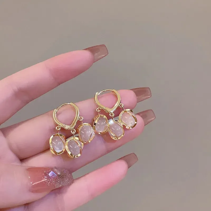 Aretes triple perla y corazón fantasía 190840