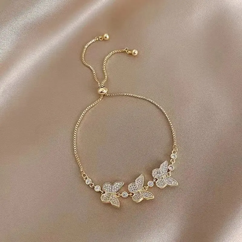 Pulsera triple mariposa ajustable fantasía fina 260128