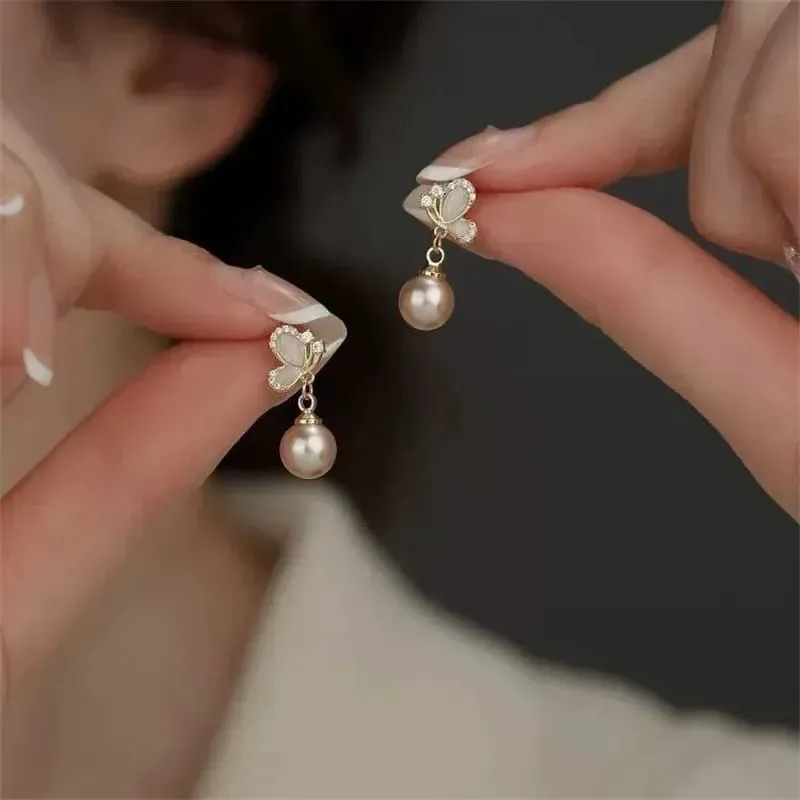 Aretes de gota patron de mariposa y piedra de ojo de gato 301022