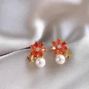 Aretes con diseño de flor y perlas  160932