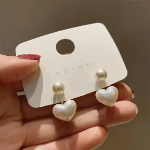 Aretes corazón y borla blanca fantasía 260120